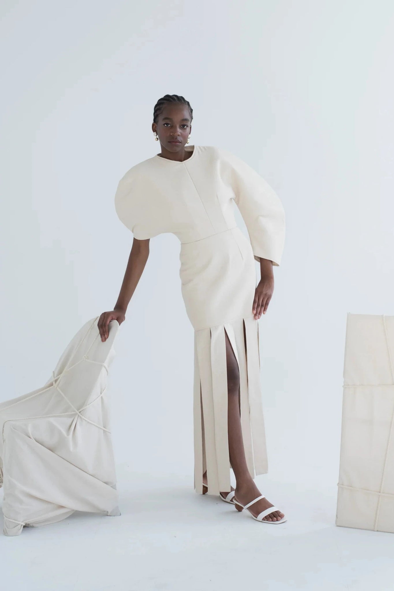 Sculptured Oval Sleeve Tassel Dress