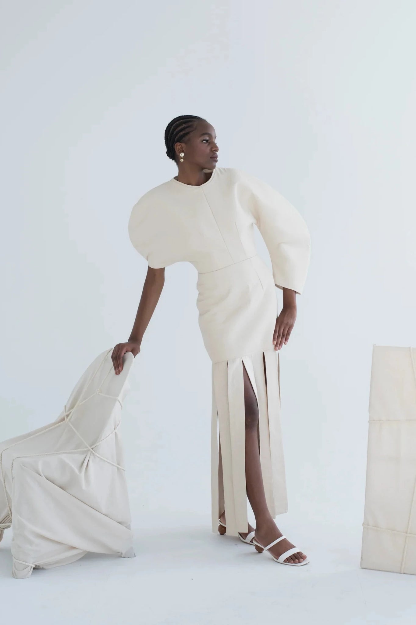 Sculptured Oval Sleeve Tassel Dress