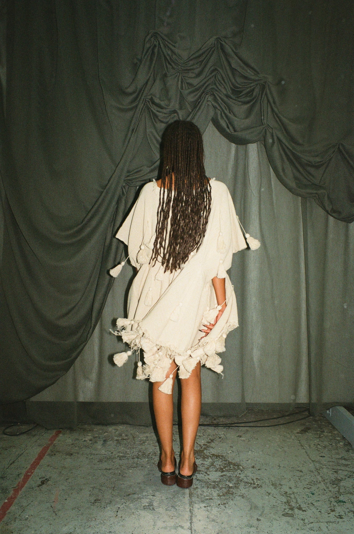 CREAM SMOCK WITH TASSELS